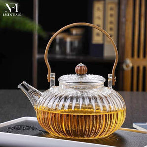 NFI essentials Ribbed Glass Teapot with Wooden Handle, Removable Filter & Drip-Free Spout for Loose Leaf and Blooming Tea, Heat Resistant Kettle Stovetop & Microwave Safe