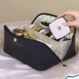 NFI essentials Cosmetic Travel Organizer Bag, Women's Makeup Pouch Toiletry Bag Portable Leather Wide Opening Cosmetics Bag with Handle and Divider - AYAHA ENTERPRISES PRIVATE LIMITED