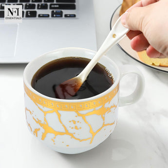 NFI essentials Set of 4 Ceramic Tea Cups With Stand Safe for the Microwave and Dishwasher Stackable Tea Cup  Printed Coffee Mugs for Gifting with Holder 150 ML - AYAHA ENTERPRISES PRIVATE LIMITED