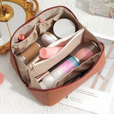 NFI essentials Cosmetic Travel Organizer Bag, Women's Makeup Pouch Toiletry Bag Portable Leather Wide Opening Cosmetics Bag with Handle and Divider - AYAHA ENTERPRISES PRIVATE LIMITED