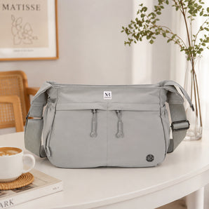 NFI essentials Sling Bag for Women, Multi Pocket Crossbody Bag for Travel