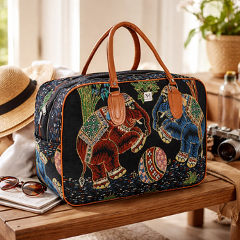Handcrafted embroidered elephant tapestry travel bag with leather handles