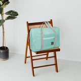 NFI essentials Foldable Duffle Bag Luggage Travelling Bag Lightweight Carry on Travel Duffel Bag for Airplane, Beach Bag, Gym Sports - AYAHA ENTERPRISES PRIVATE LIMITED